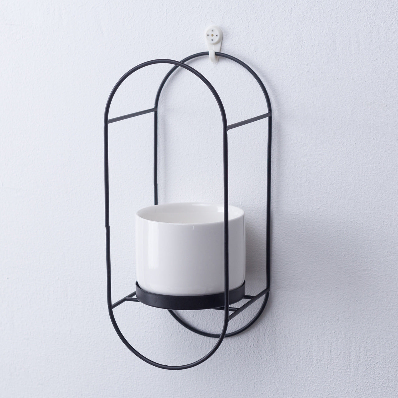 Oval iron frame ceramic flower pot